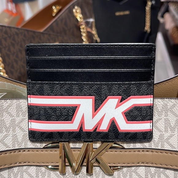 MICHAEL KORS MENS
Cooper Graphic Logo Tall Card Case
Style# 36S3LCOD2B
PINK 
NWT - Picture 10 of 16